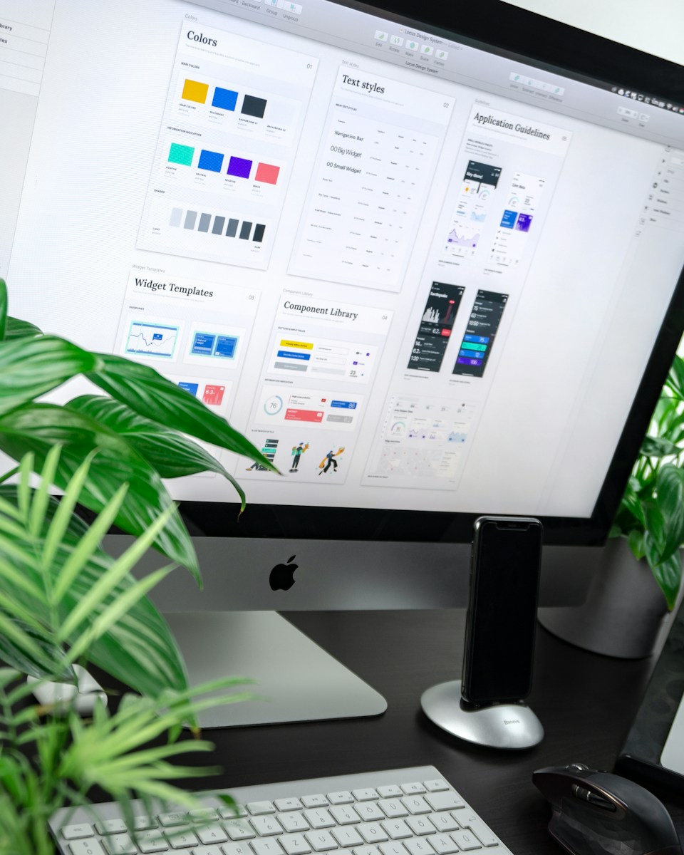 Photo by Balázs Kétyi silver iMac displaying color gradient
