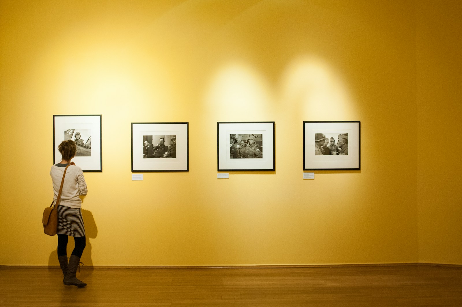 Photo by Elimende Inagella 3 black wooden framed wall mounted photos